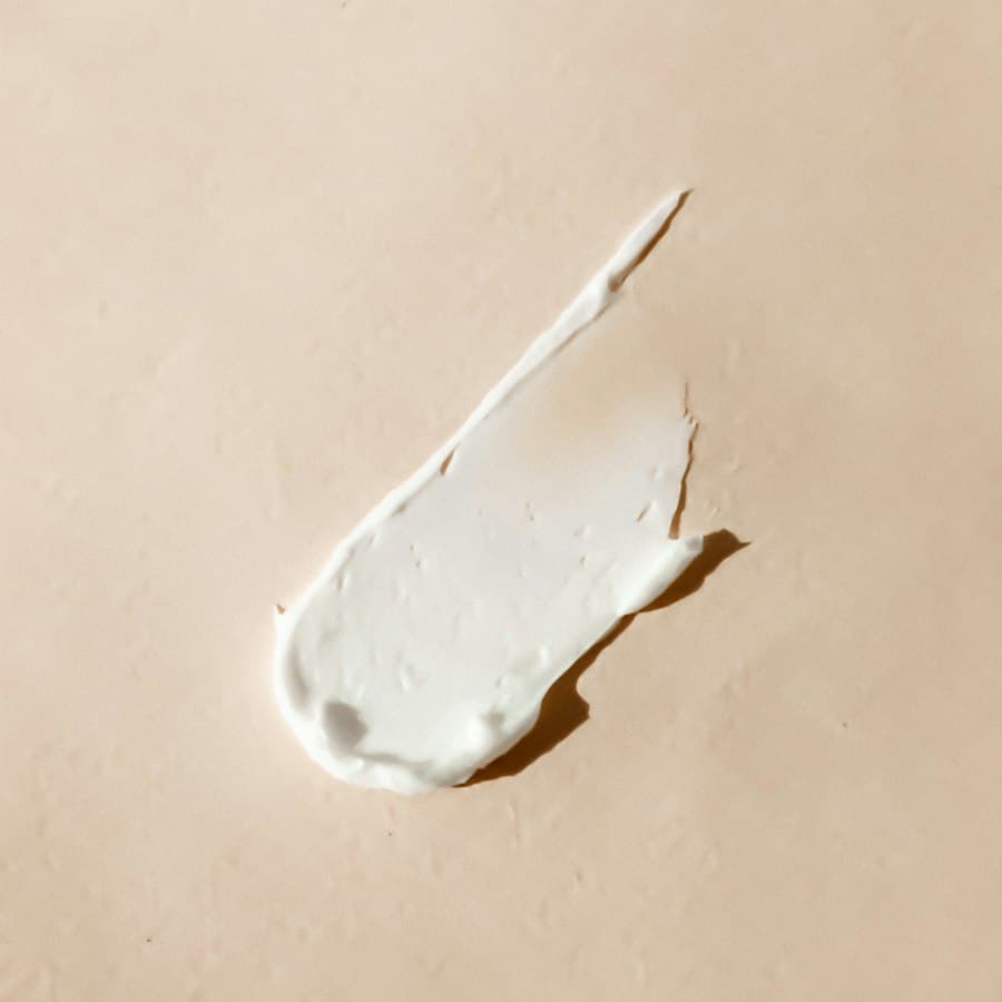 Textura de creme hidratante espalhada